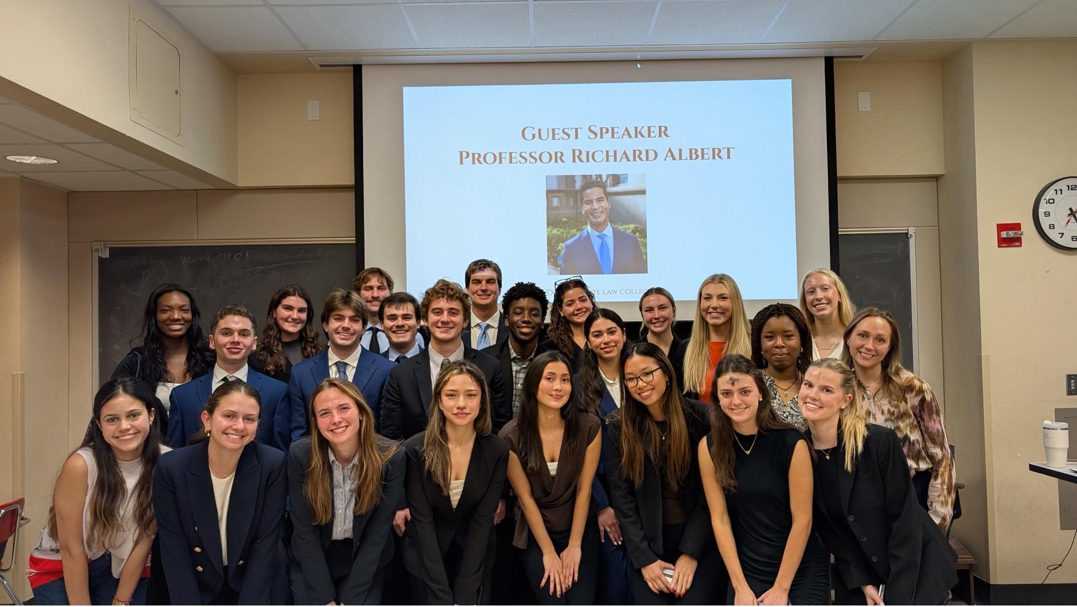 Members of the Texas Corporate Law Collective gathered after Professor Richard Albert's guest seminar